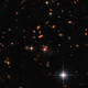 Imagen para el artículo titulado El telescopio Webb encuentra un denso nudo cósmico en el universo primitivo